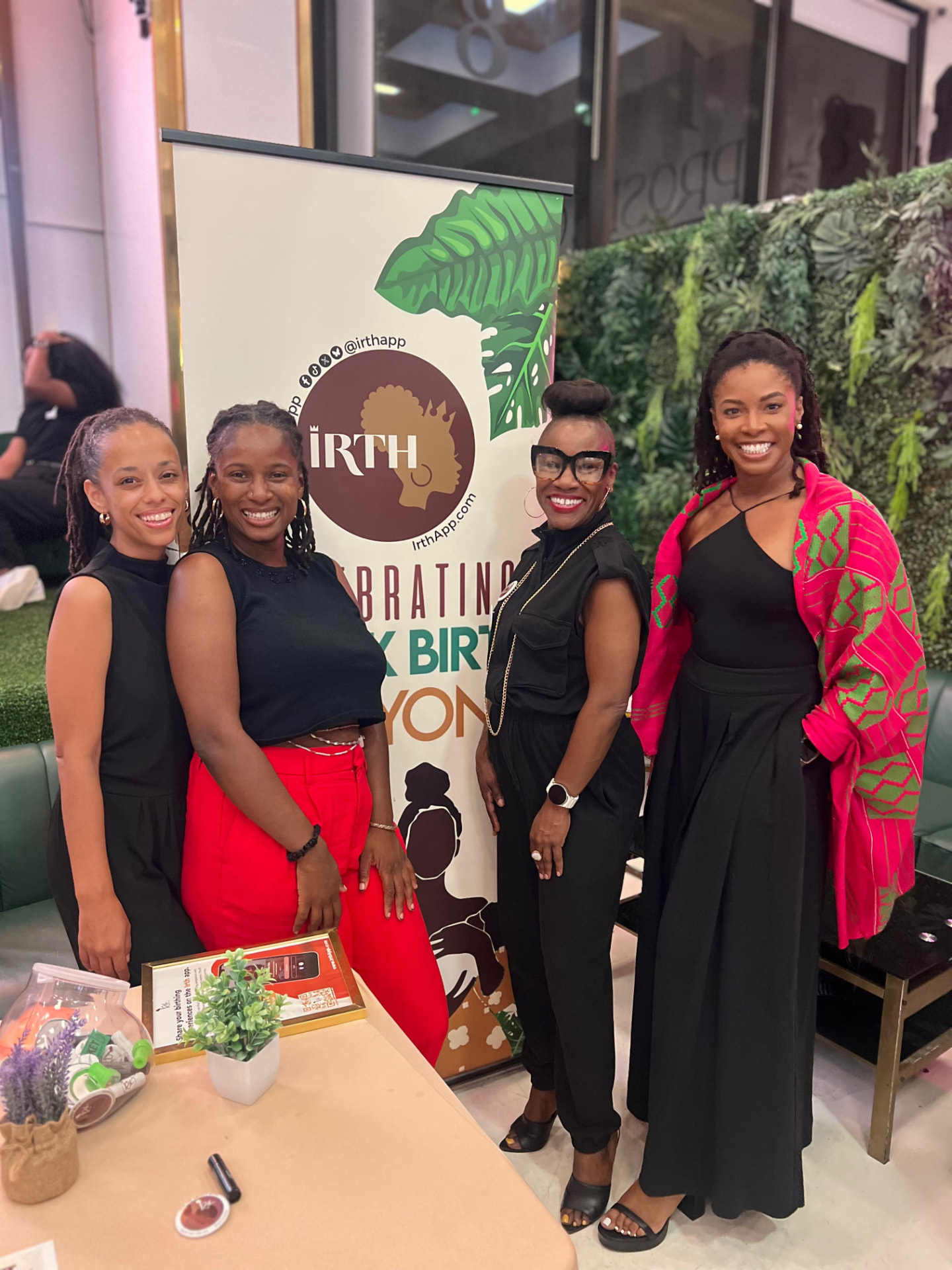 Ambassadors at the Irth booth celebrating Black birth